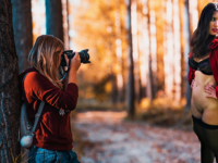 Exposing her amateur pussy for photosession in public