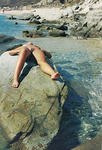 Amateur exhibiting herself at the beach