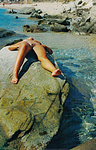 Amateur exhibiting herself at the beach