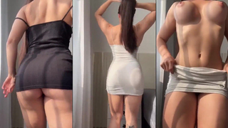 Morena cavala escolhendo qual o vestido